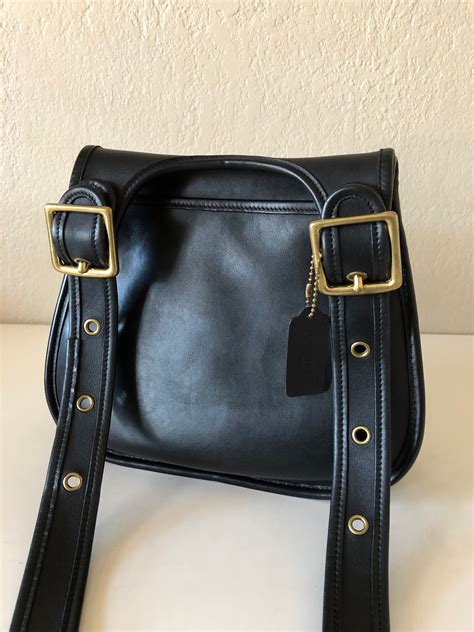 vintage coach saddle pouch.